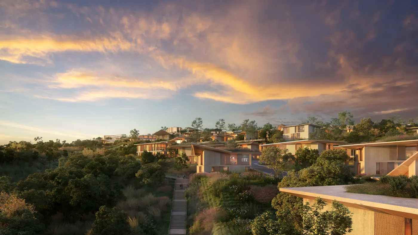 Branded residences stepping down the Mira Verde hillside at sunset
