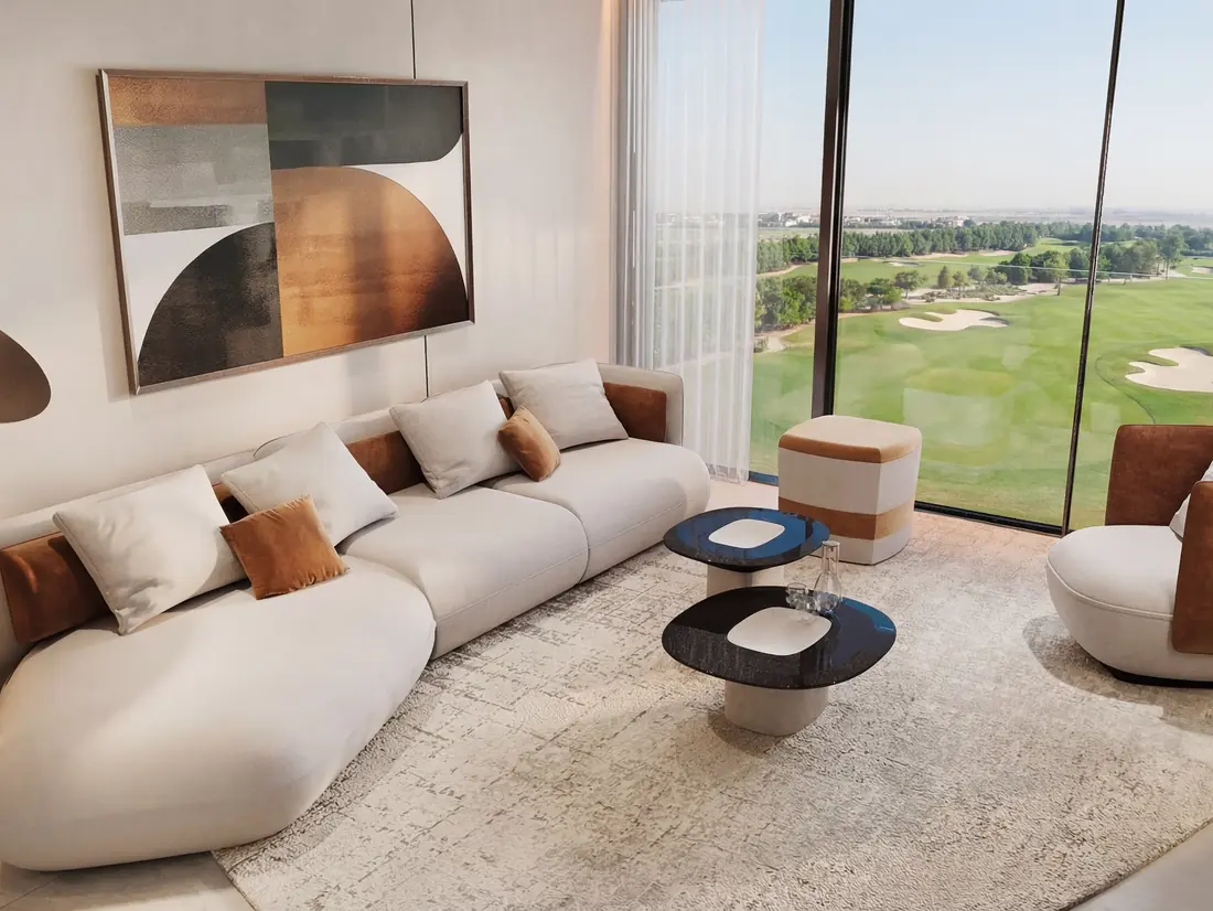 Sofa and lounge chairs facing the golf course